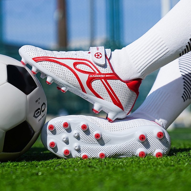 Football boots featuring conical studs for improved agility, rotational movement, and natural foot release