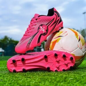 Rear view of easy clean youth soccer cleats showing removable insole access