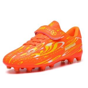 Kid wearing reinforced toe soccer shoes on firm grass field during aggressive play