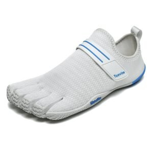 Runner wearing barefoot five finger running shoes on trail, enjoying natural movement