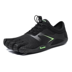 Hiker wearing wide toe box barefoot hiking shoes on rocky trail, enjoying natural movement